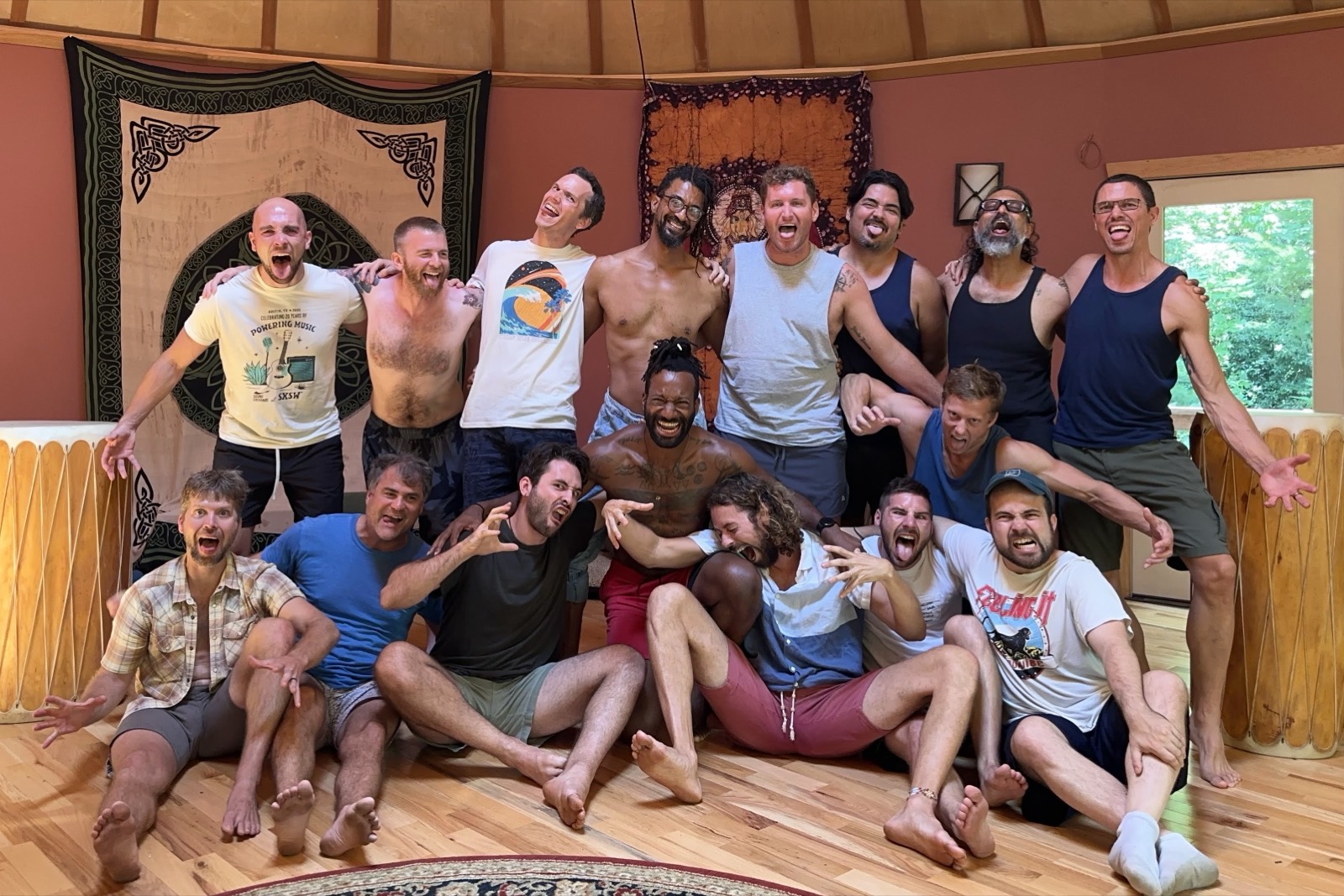 Men gathered together at a Heart of Men retreat